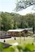 Luxury holiday lodges set in landscaped ground and woodlands